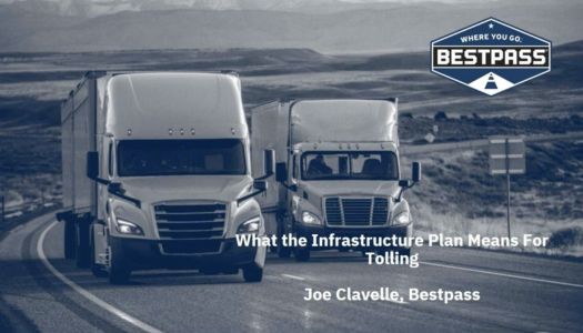 In grayscale, two white tractor trailers are cruising down a deserted highway. The blue Bestpass logo is at the upper right of the image, and at the bottom right is white text that reads "What the Infrastructure Plan Means For Tolling - Joe Clavelle, Bestpass."
